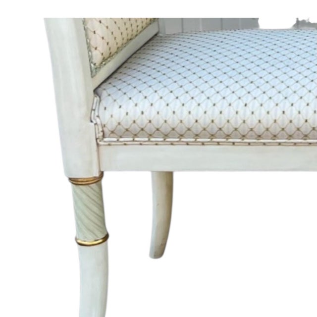 This is a 1970s Italian neoclassical style upholstered bench. The upholstery is vintage and in good condition. The painted...