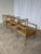 Set of 4 wooden dining armchairs manufactured by STOL Kamnik in former Yugoslavia around the 1960s–1970s. These vintage...