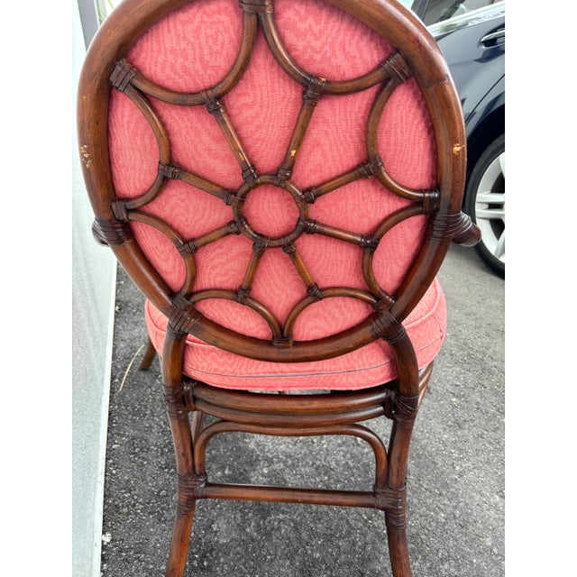 Rattan dining set styled after McGuire with stunning “spiderback” design. Chairs with classic McGuire like, leather...