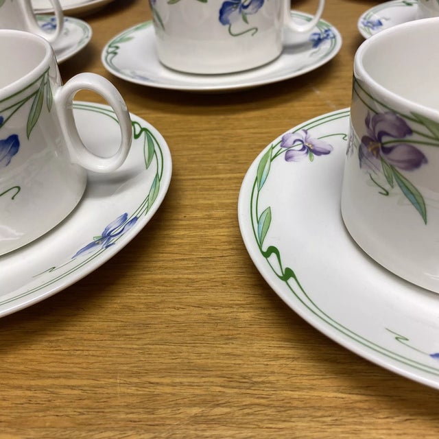 Bring timeless European elegance to your table with this set of 8 flat cups and saucers from the Villeroy & Boch Verona...