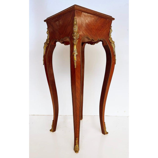 Louis XV style nightstand with gorgeous floral and herringbone marquetry, herringbone inlaid box, gilt bronze mounts, one...