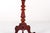 This lovely antique (19th century) mahogany tripod table is a charming piece that combines the timeless appeal of mahogany...