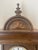 Antique windup mechanical clock 31 days wind up and chimes. Enamel face and pendulum. Working condition.