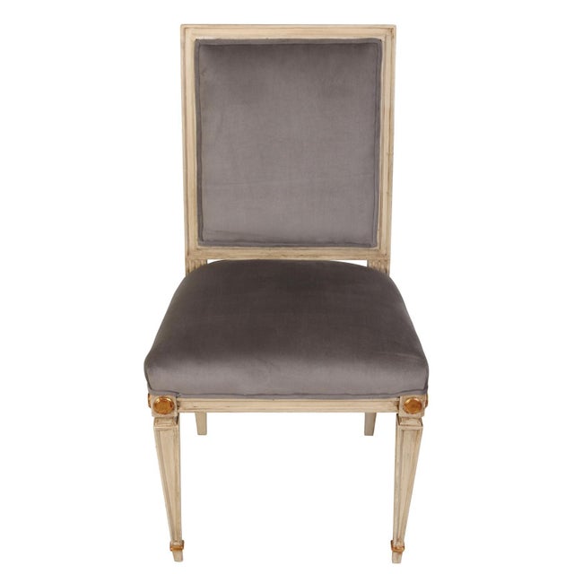 We love the Louis XVI style for its classic, understated elegance. These eight chairs are no exception. Painted in a...