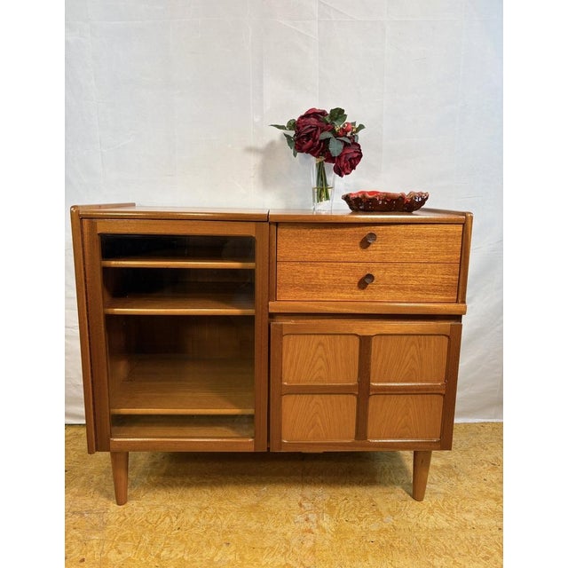 Mid century retro teak music cabinet by nathan (circa 1960) a fantastic and funky mid century modern teak music cabinet by...