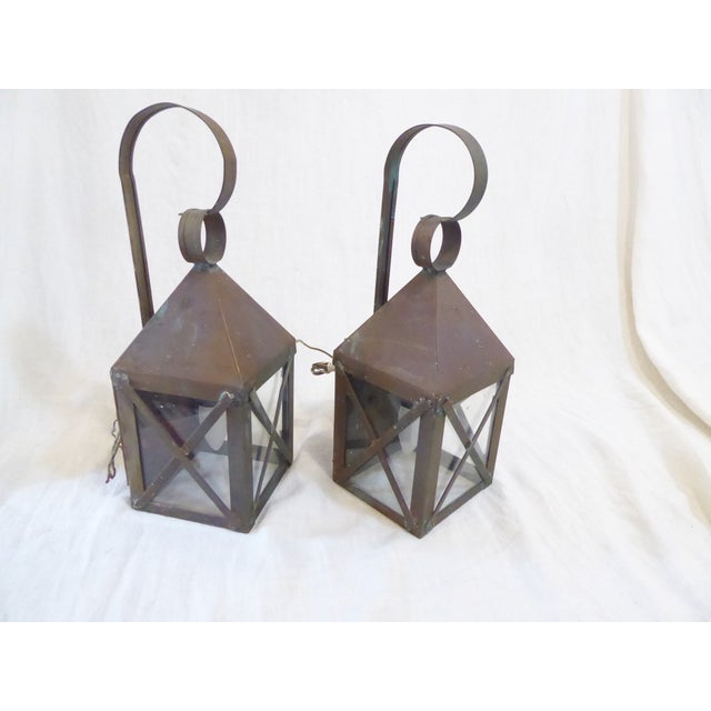 This pair of copper lantern sconces use a single Edison base bulb up to 100 Watts. They ship with the glass removed and...