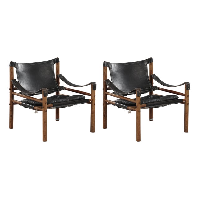 Vintage Scirocco Safari Lounge Chairs in Black Leather and Wood by Arne Norell for Arne Norell AB, 1960s, Set of 2 For Sale