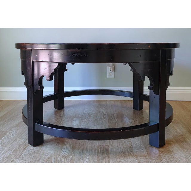 This is a beautiful rustic coffee table by Sherrill. Each corner of the legs has a decorative wave cut out. It is made...