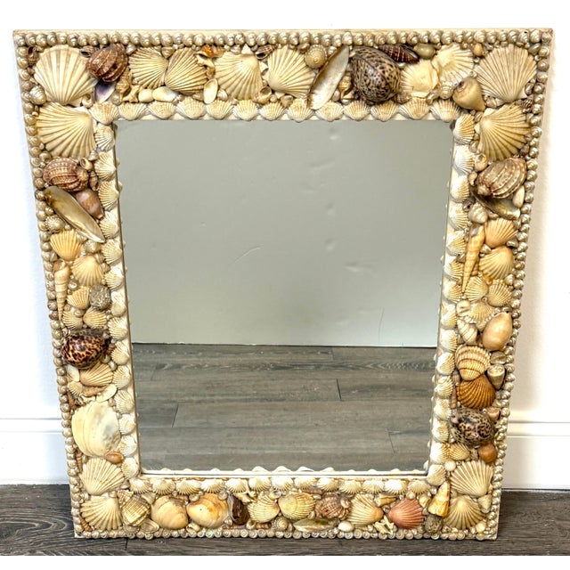 1960s Coastal Bohemian Specimen Shell Encrusted Mirror with Tiger Cowries. Richly decorated with an impressive assortment...