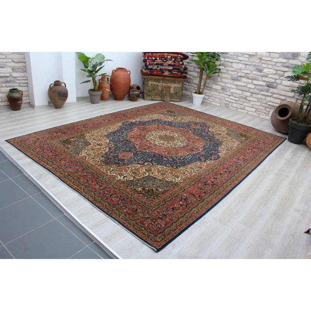This gorgeous hand knotted Vintage Anatolian area rug is approximately 70 years old in excellent vintage condition. The...