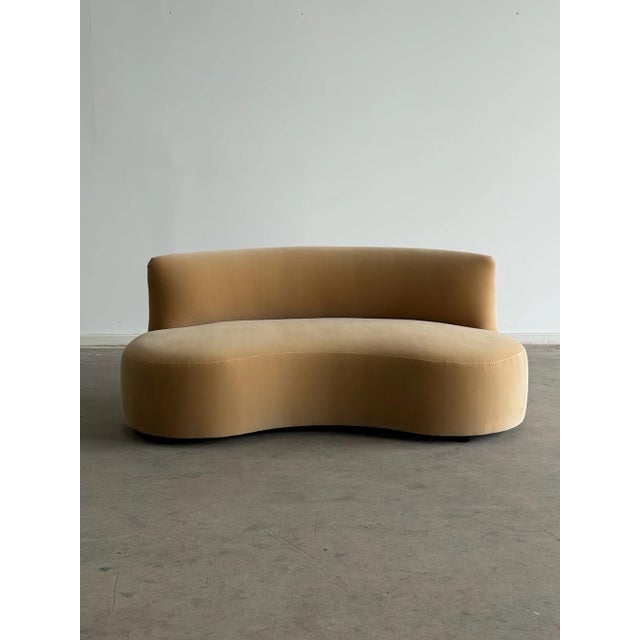 W71 D30 H29 SW69 SD23.5 SH17 Overall Depth 37 This kidney shaped sofa upholstered in a butter toned cotton velvet. This...