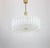 Fantastic midcentury chandelier by doria, germany, manufactured circa 1970-1979, with 35 murano glass cylinders suspended...