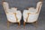 A wonderfully elegant and inviting pair of Louis XV-style balloon-back bergère armchairs, dating to approximately the...
