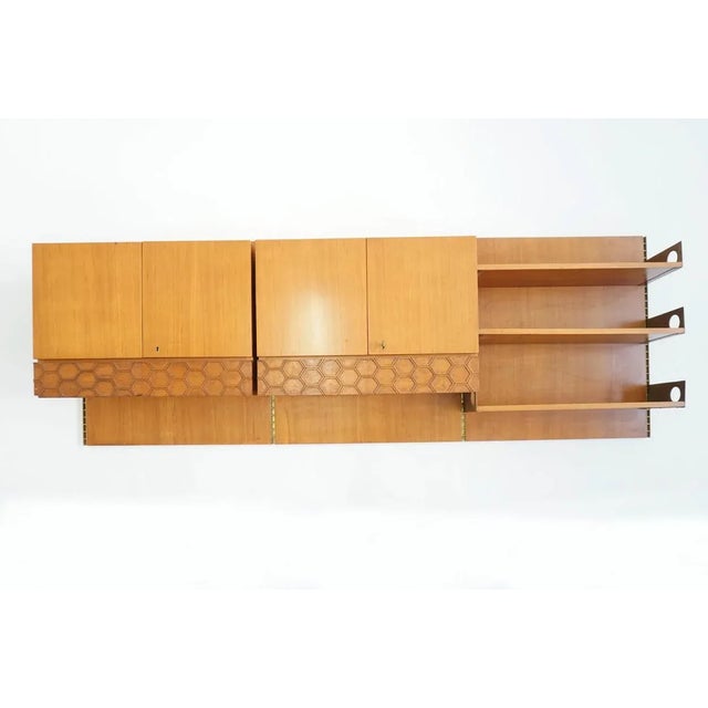 Italian Suspended Wall Bookshelf with Cabinets and Drawers from La Permanente Mobili Cantù, 1960s, in None conditions....