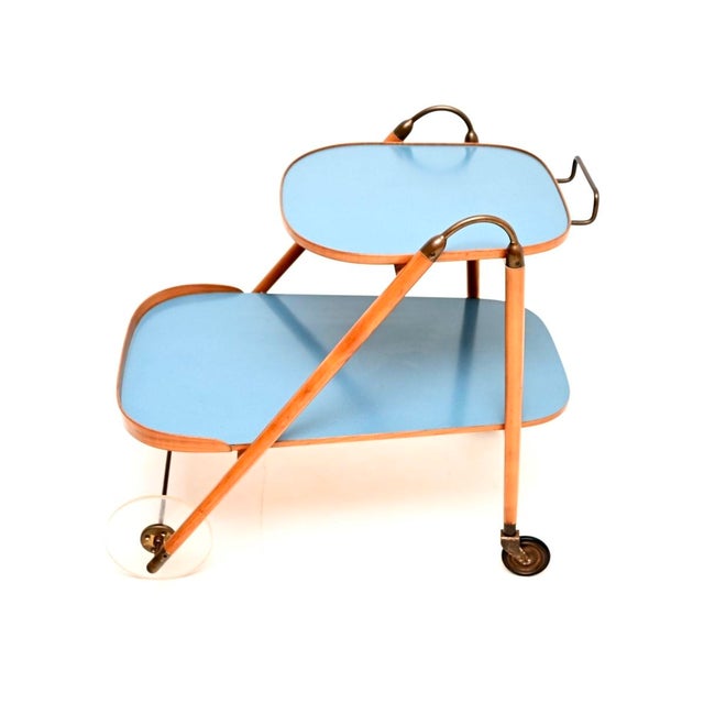A stylish and incredibly rare vintage Italian drinks trolley, dating from around the 1950’s. This has a beautiful and...