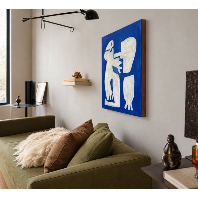 This artwork depicts a male figure reduced to its essence, constructed from deliberately fragmented geometric forms....