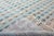 A field of pebbles, fading from stone to twilight. Rows of raised, dot-like tufts cover this piece in a rhythmic grid,...