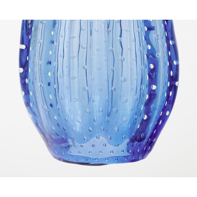 Blue glass pendant from the Island of Murano blown in the Pulegoso technique. (Puleghe means bubbles). This pendant has...