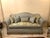 Transform your home with the timeless elegance of this magnificent French Louis XVI-inspired grand sofa, expertly...