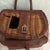 Antique fishing creel (basket). Made of wicker and leather. Front leather pouch with clasp. Canvas and leather crossbody...