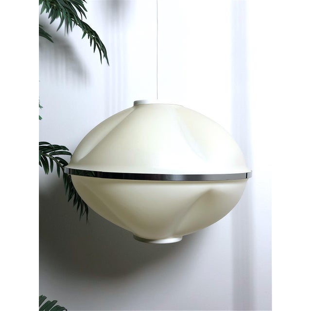 Space age chandelier 70s made in italy the chandelier is inspired by space and futuristic design, very popular in the 70s....