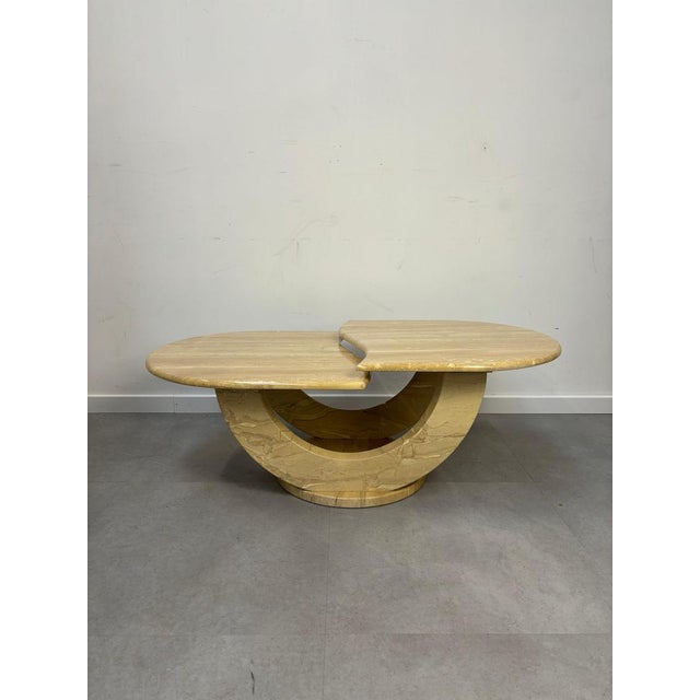 Travertine two tier coffeetable. This coffeetable is fully rotatable and comes in three pieces. Mint condition 120 x 65 x...