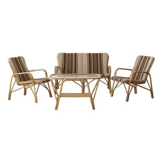 Danish Rattan Lounge Set with Sofa, Armchairs and Coffee Table, 1970s, Set of 4 For Sale