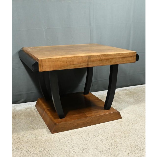 This walnut living room coffee table, dating from the art deco era of the 1930s, is a remarkable piece of furniture for...