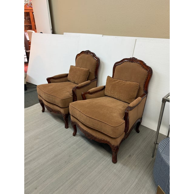 Design Plus Gallery presents a Pair of Bergères from the Protege Collection by Fine Furniture Design. These chairs were...