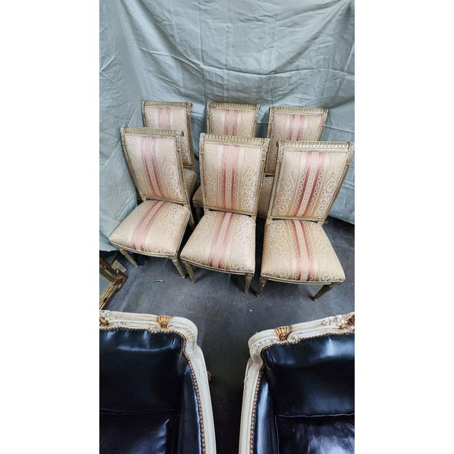 This listing features a set of 6 French Neoclassical style Louis XVI dining chairs with carved foliate crest, ornate...