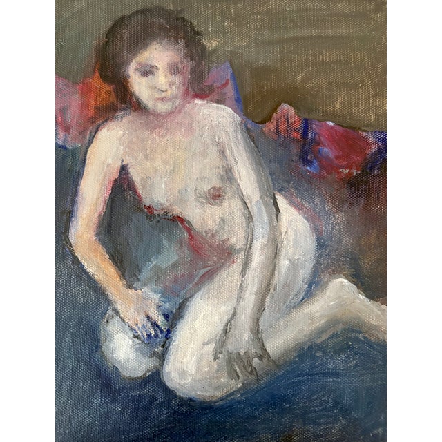 A small and expressive vintage figurative oil painting depicting a seated female nude. The figure is rendered with loose,...