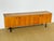 Magnificent vintage Scandinavian teak sideboard dating from the 1960s, featuring four storage doors with shelves. The...