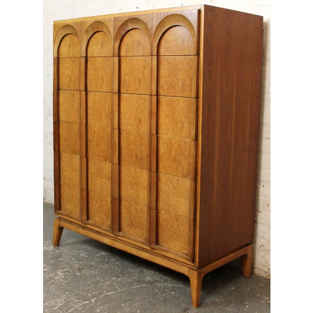 Thomasville Mid-Century “Arched” 6-Drawer Highboy Dresser in walnut with olive burl fronts, circa 1960s. Sculptural bowed...