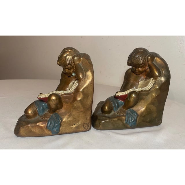Large Pair Antique Armor Patinated Bronze Clad Co. Cherub Boy Reading Bookends For Sale In New York - Image 6 of 12