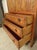 Handsome dresser by Widdicomb with walnut grain, six total drawers, brass spade handles. Back has a finished wood panel....