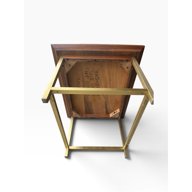 • Drexel Heritage (Sun Coast line) • Materials: Solid wood/teak or walnut frame, golden brass-finished metal legs, a woven...