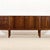 Designed by tom robertson for a.h. Mcintosh’s prestigious *dunfermline* collection in scotland, this exquisite sideboard...
