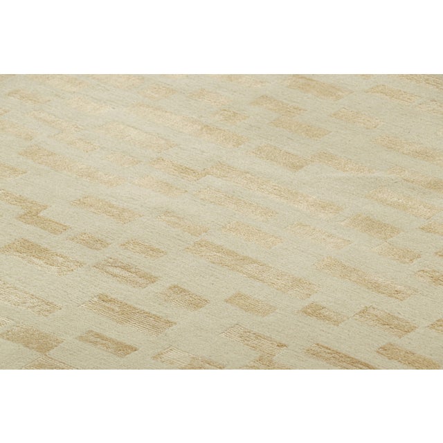 Hand-knotted in a luxurious blend of wool and silk, this 8x10 rug is the newest exciting addition to the Modern collection...