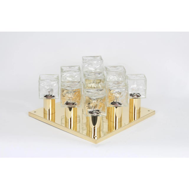 A stunning large flushmount by kalmar, austria, manufactured in the 1960s. The flush mount is composed of 13 thick...