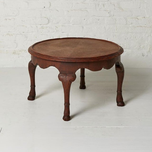 This 19th Century Belgian Oak Coffee Table brings timeless European charm and rich character to any living space. Crafted...