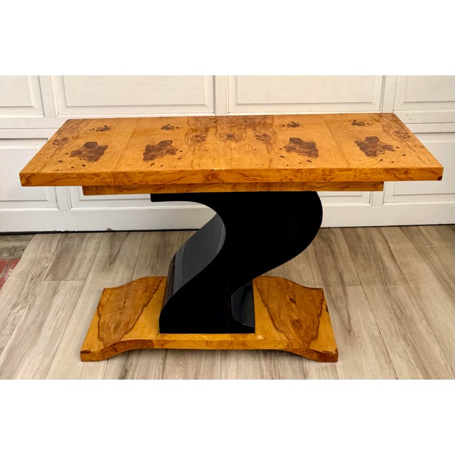 Here is a sculptural Art Deco Revival console table, dating to the later part of the 20th c. The double stacked top...