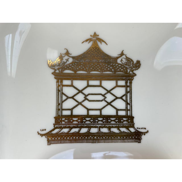 Lovely two-section milk glass dish with metallic gold chinoiserie pagoda design, circa 1950's. Perfect for catchall for...