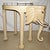 The Hand Carved Wood Elephant Rolling Bar Cart Table by Marge Carson, circa 1990s, is a unique and stylish piece of...