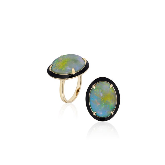 G-One' Black Opal Cabochon Ring With Enamel In 18K Yellow Gold. Appox Stone Wt- 15.04 cts.