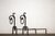 A pair of hand-forged Brutalist wrought iron andirons. Made in Italy in the 1970s. Exquisite craftsmanship. Excellent...