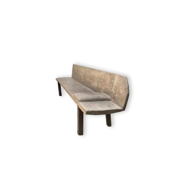 This hand-carved teak wood bench originates from the Island of Madura, off the coast of Northeastern Java. It is unique...