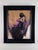 The artwork presents a solitary figure seated in a contemplative pose, enveloped in a rich interplay of warm and cool...