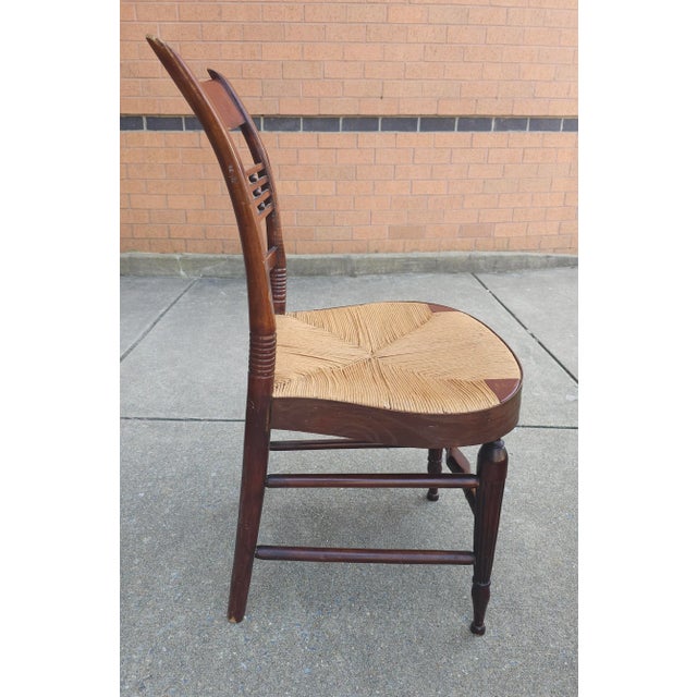 A 20th Century Victorian with rish seat Side Chair measuring 19" in width, 19" in depth and standing 33.5" in height. Seat...