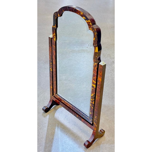 Antique shell and horn tilt-top vanity table mirror with stand. Tortoise veneer frame and stand with finished back....
