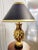 Vintage pineapple table lamp with gold leaf and a gold foil lined black shade. This lamp appears to be made of wood with a...